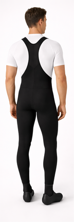 Person wearing a black cycling bib overalls with a white shirt, shown from front and back on a white background.