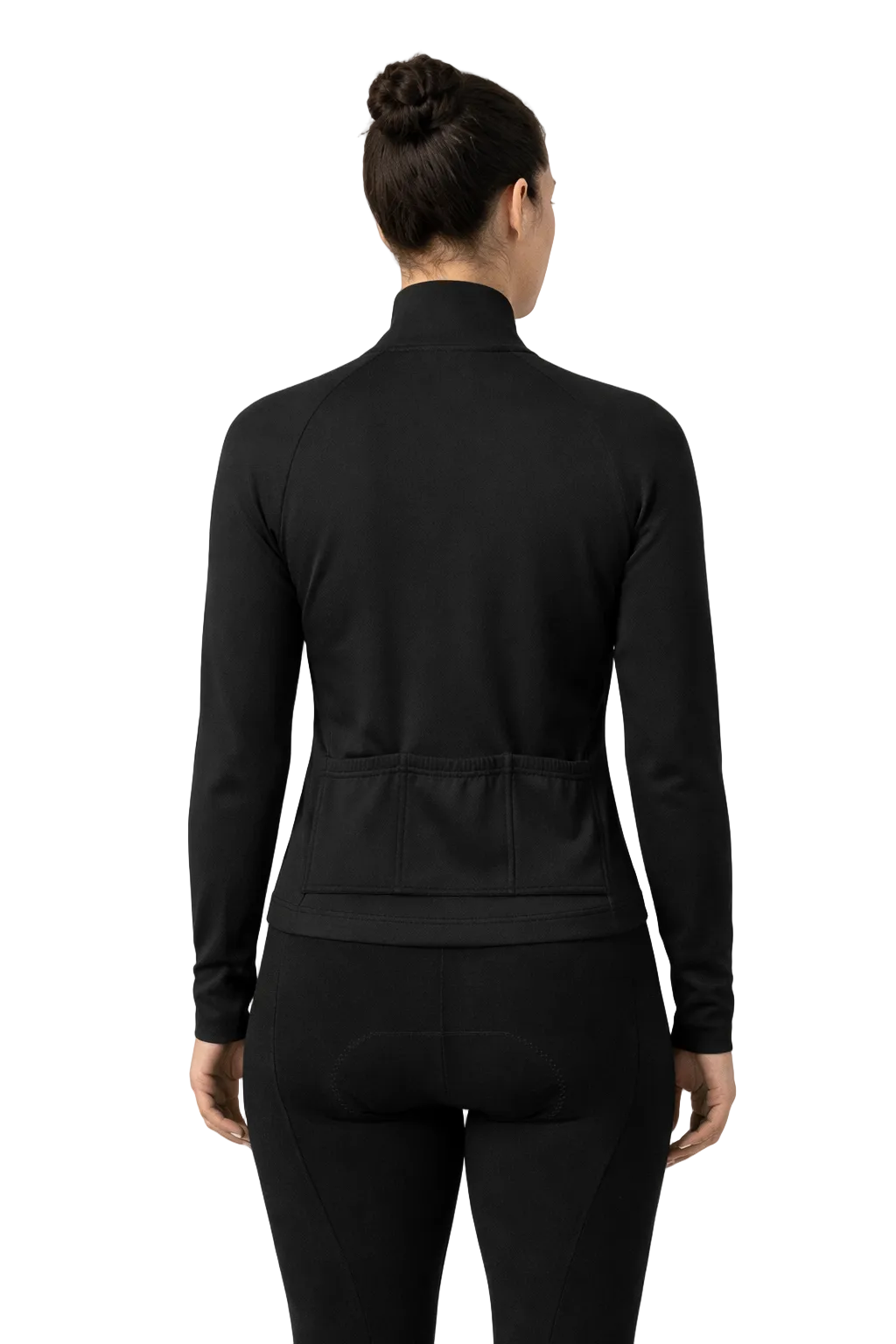 Person wearing a black long-sleeve athletic top and leggings on a white background