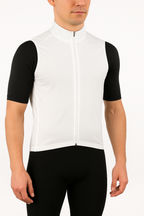 Person wearing a white cycling vest with black sleeves on a white background